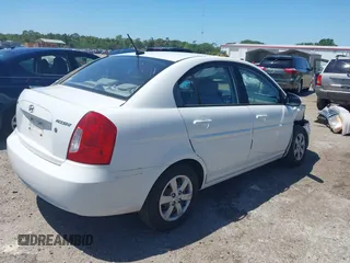 2009 Hyundai Accent Auto GLS with VIN KMHCN46C29U331834, listed as a IAAI auction lot 42027159 with 68,527 mi miles. Bid and sale history available at carsss.com. Image 4.