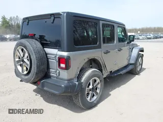 2018 Jeep Wrangler Unlimited Sahara with VIN 1C4HJXEG4JW141540, listed as a IAAI auction lot 42148402 with 43,909 mi miles and . Bid and sale history available at DreamBid. Image 4.