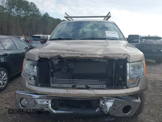 2011 Ford F-150 XL with VIN 1FTFW1EF1BFA05171, listed as a IAAI auction lot 41524808 with 216,946 mi miles. Bid and sale history available at carsss.com. Image 12.