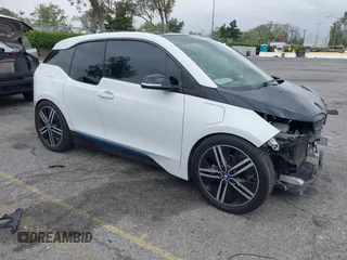 2017 BMW i3 z VIN WBY1Z8C36HV894971, wystawiony jako IAAI lot #42108014 z przebiegiem 139 802 mil mil oraz . Historia ofert i sprzedaży dostępna na DreamBid. Obrazek 1.