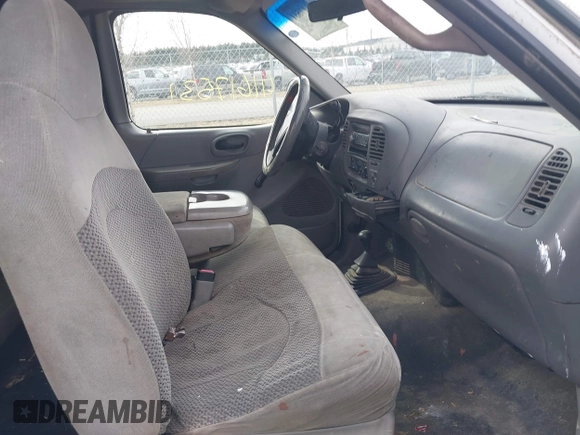 1999 Ford F-150 с VIN 1FTRX18W2XNB30523, выставлен на аукционе IAAI как лот 41617531 с пробегом 319 673 миль миль и . История ставок и продаж доступна на DreamBid. Изображение 5.