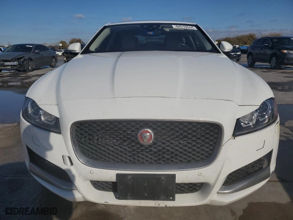 2016 Jaguar XF 35t Prestige with VIN SAJBE4BV8GCY02512, listed as a Copart auction lot 84510554 with 135,293 mi miles and Salvage Title. Bid and sale history available at carsss.com. Image 5.
