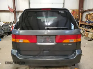 2003 Honda Odyssey EX with VIN 2HKRL18603H008412, listed as a Copart auction lot 87502365 with 352,773 mi miles and Salvage Title. Bid and sale history available at DreamBid. Image 6.
