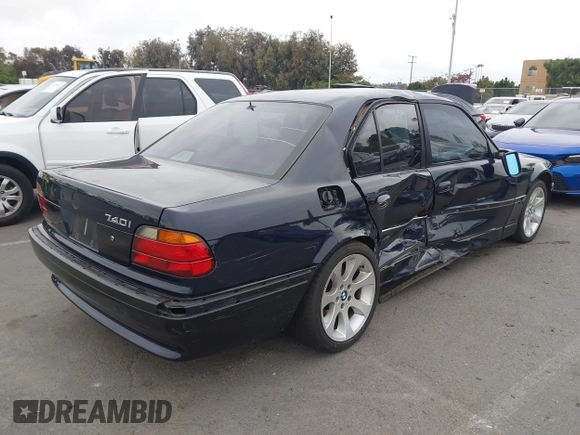 1998 BMW 7 Series with VIN WBAGF8323WDL57406, listed as a IAAI auction lot 42428227 with 93,448 mi miles and . Bid and sale history available at DreamBid. Image 4.