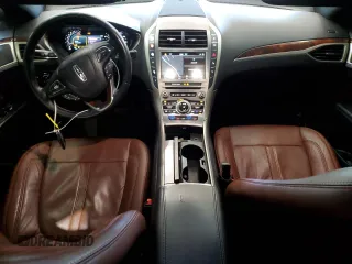 2017 Lincoln MKZ Reserve z VIN 3LN6L5E94HR644680, wystawiony jako Copart lot #52596035 z przebiegiem 124 142 mil mil oraz Szkody całkowita. Historia ofert i sprzedaży dostępna na DreamBid. Obrazek 8.