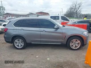 2016 BMW X5 xDrive35i z VIN 5UXKR0C53G0P19015, wystawiony jako IAAI lot #41930862 z przebiegiem 150 762 mil mil oraz . Historia ofert i sprzedaży dostępna na DreamBid. Obrazek 14.