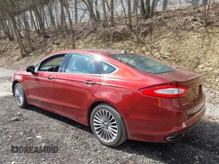 2014 Ford Fusion Titanium with VIN 3FA6P0K93ER123984, listed as a IAAI auction lot 42049931 with 60,443 mi miles. Bid and sale history available at carsss.com. Image 3.