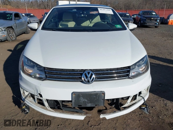 2015 Volkswagen Eos Komfort with VIN WVWBW8AH0FV001011, listed as a IAAI auction lot 41297299 with 81,444 mi miles and . Bid and sale history available at DreamBid. Image 18.