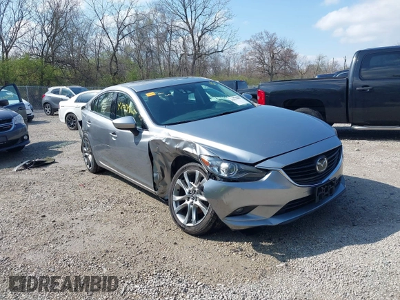 2015 Mazda 6 i Grand Touring with VIN JM1GJ1W52F1195333, listed as a IAAI auction lot 42014865 with 107,039 mi miles and . Bid and sale history available at DreamBid. Image 1.