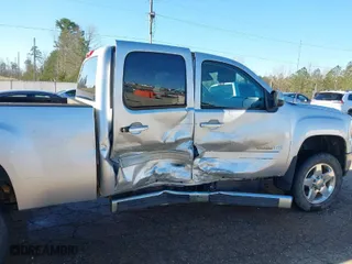 2013 GMC Sierra 2500HD SLT with VIN 1GT121C82DF218580, listed as a IAAI auction lot 41758693 with 121,798 mi miles. Bid and sale history available at carsss.com. Image 6.