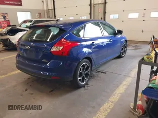 2013 Ford Focus SE with VIN 1FADP3K26DL336078, listed as a IAAI auction lot 41754365 with 104,568 mi miles. Bid and sale history available at carsss.com. Image 4.