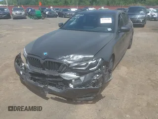 2023 BMW 5 Series M550i xDrive with VIN WBA13BK02PCN47443, listed as a IAAI auction lot 42290388 with Not provided miles and . Bid and sale history available at DreamBid. Image 6.