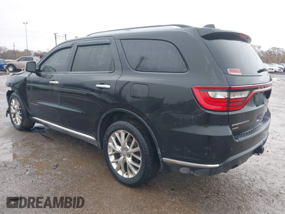 2014 Dodge Durango Citadel with VIN 1C4RDJEG5EC466164, listed as a IAAI auction lot 40936279 with 259,102 mi miles and . Bid and sale history available at DreamBid. Image 3.