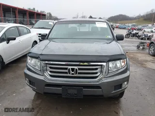 2012 Honda Ridgeline RT with VIN 5FPYK1F24CB456298, listed as a IAAI auction lot 40869948 with 123,329 mi miles. Bid and sale history available at carsss.com. Image 12.