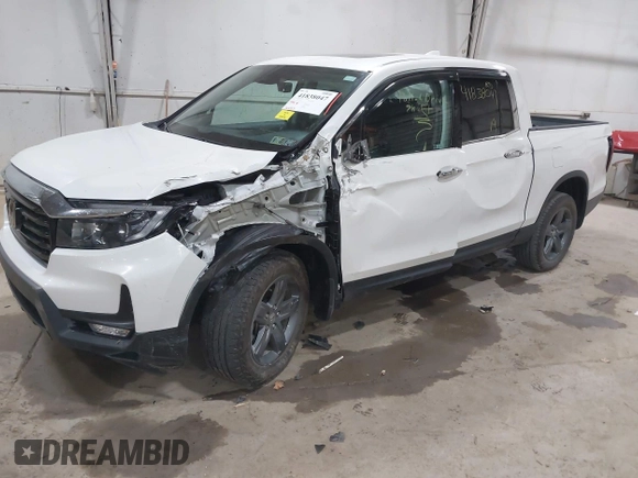 2022 Honda Ridgeline RTL-E z VIN 5FPYK3F76NB033832, wystawiony jako IAAI lot #41838047 z przebiegiem 16 497 mil mil oraz . Historia ofert i sprzedaży dostępna na DreamBid. Obrazek 2.