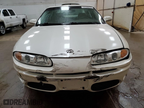 2003 Oldsmobile Aurora z VIN 1G3GS64C534171677, wystawiony jako Copart lot #74768254 z przebiegiem 113 932 mil mil oraz Tytuł czysty. Historia ofert i sprzedaży dostępna na DreamBid. Obrazek 5.