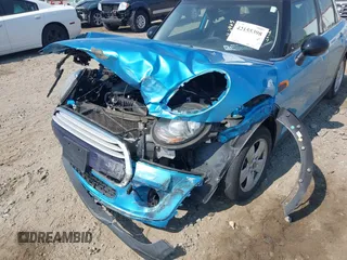 2015 MINI Hardtop 4 Door with VIN WMWXS5C56FT831505, listed as a IAAI auction lot 42155398 with 95,693 mi miles and . Bid and sale history available at DreamBid. Image 6.