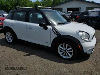 2014 MINI Countryman S z VIN WMWZC5C51EWP35221, wystawiony jako Copart lot #58718545 z przebiegiem 152 809 mil mil oraz Tytuł czysty. Historia ofert i sprzedaży dostępna na DreamBid. Obrazek 4.