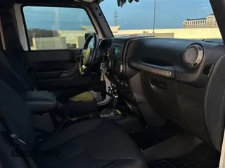 2018 Jeep Wrangler JK Unlimited Sport S with VIN 1C4BJWDG3JL805961, listed as a Copart auction lot 42876675 with 58,839 mi miles and Salvage Title. Bid and sale history available at carsss.com. Image 5.