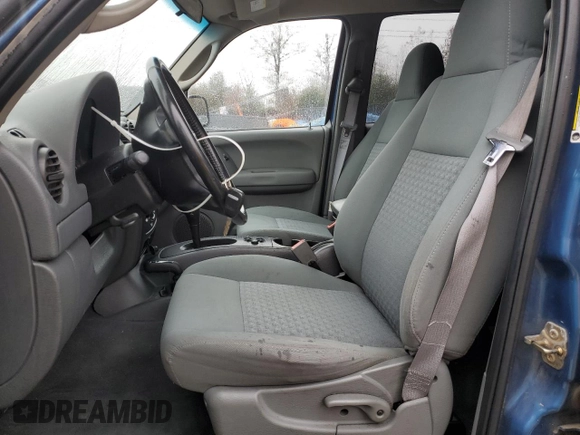 2005 Jeep Liberty Sport with VIN 1J4GL48535W610454, listed as a Copart auction lot 81914214 with 127,181 mi miles and Salvage Title. Bid and sale history available at DreamBid. Image 7.