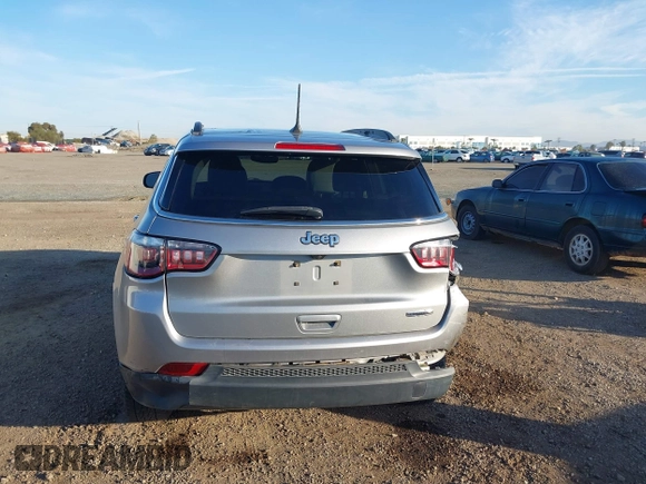 2019 Jeep Compass Altitude with VIN 3C4NJCBB0KT743606, listed as a IAAI auction lot 41468490 with 57,787 mi miles and . Bid and sale history available at DreamBid. Image 16.