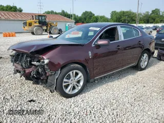 2011 Lincoln MKS with VIN 1LNHL9DR8BG613710, listed as a Copart auction lot 60652055 with 99,877 mi miles and Salvage title. Bid and sale history available at DreamBid. Image 1.