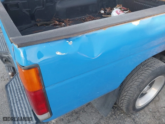 1993 Nissan Trucks 2WD with VIN 1N6SD11S1PC310246, listed as a IAAI auction lot 41838011 with 219,398 mi miles. Bid and sale history available at carsss.com. Image 6.