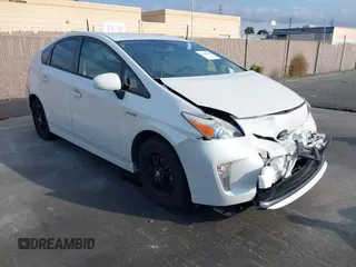 2015 Toyota Prius Four z VIN JTDKN3DU2F1927674, wystawiony jako IAAI lot #41445928 z przebiegiem 107 976 mil mil oraz . Historia ofert i sprzedaży dostępna na DreamBid. Obrazek 1.