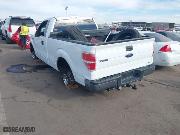 2014 Ford F-150 XL with VIN 1FTMF1CM3EKG36797, listed as a IAAI auction lot 40892574 with 136,417 mi miles. Bid and sale history available at carsss.com. Image 3.