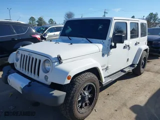2016 Jeep Wrangler Unlimited 75th Anniversary with VIN 1C4BJWEG3GL194420, listed as a IAAI auction lot 41678849 with 127,194 mi miles. Bid and sale history available at carsss.com. Image 2.