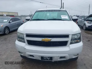 2014 Chevrolet Suburban LT with VIN 1GNSCJE06ER154639, listed as a IAAI auction lot 41410623 with 213,592 mi miles. Bid and sale history available at carsss.com. Image 12.
