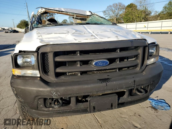 2002 Ford Super Duty F-250 XL with VIN 1FTNF21L52EC49070, listed as a Copart auction lot 75403484 with 163,606 mi miles and Salvage Title. Bid and sale history available at carsss.com. Image 5.