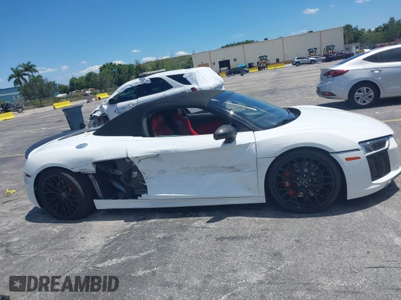 2017 Audi R8 z VIN WUAVACFX0H7903232, wystawiony jako IAAI lot #42247728 z przebiegiem 74 755 mil mil oraz . Historia ofert i sprzedaży dostępna na DreamBid. Obrazek 13.