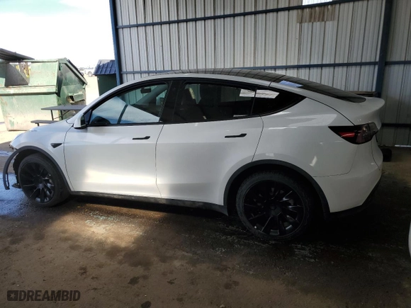 2023 Tesla Model Y Long Range with VIN 7SAYGDEE2PA050503, listed as a Copart auction lot 49387595 with 31,106 mi miles and Salvage Title. Bid and sale history available at carsss.com. Image 2.