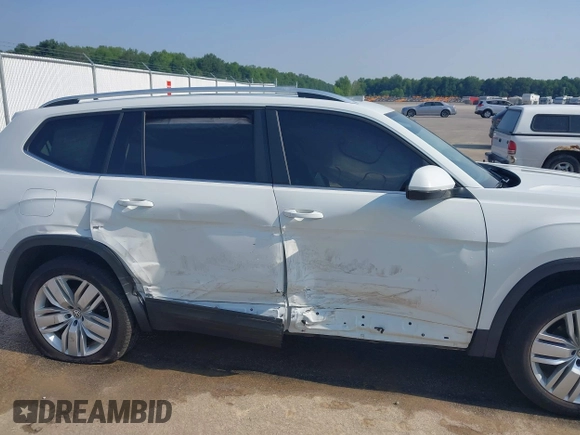 2019 Volkswagen Atlas SE with VIN 1V2UR2CA6KC549094, listed as a IAAI auction lot 42385802 with 61,718 mi miles and . Bid and sale history available at DreamBid. Image 6.