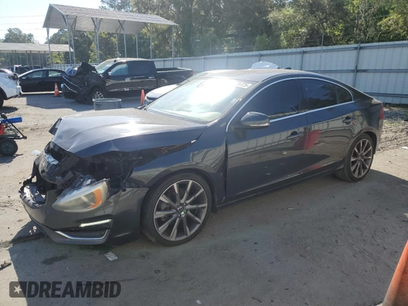 2015 Volvo S60 T5 Drive-E Premier с VIN YV140MFK2F1350695, выставлен на аукционе Copart как лот 53275725 с пробегом 98 962 миль миль и Списание • Salvage title. История ставок и продаж доступна на DreamBid. Изображение 1.