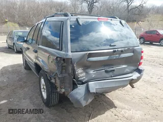 2004 Jeep Grand Cherokee Laredo z VIN 1J4GW48SX4C213322, wystawiony jako IAAI lot #41969362 z przebiegiem 273 876 mil mil oraz . Historia ofert i sprzedaży dostępna na DreamBid. Obrazek 3.