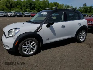 2014 MINI Countryman S z VIN WMWZC5C51EWP35221, wystawiony jako Copart lot #58718545 z przebiegiem 152 809 mil mil oraz Tytuł czysty. Historia ofert i sprzedaży dostępna na DreamBid. Obrazek 1.