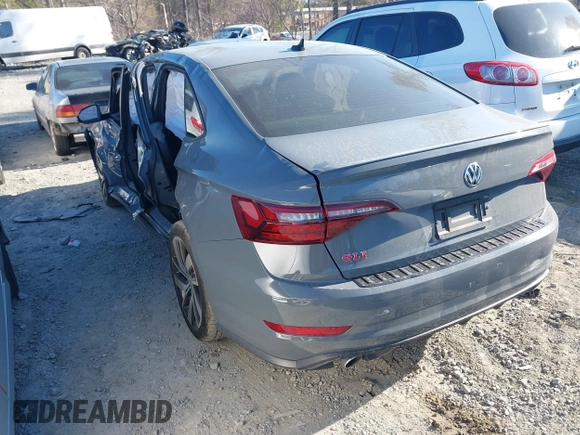 2021 Volkswagen Jetta GLI S with VIN 3VW6T7BUXMM019570, listed as a IAAI auction lot 41879222 with 42,948 mi miles and . Bid and sale history available at DreamBid. Image 3.