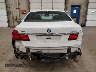 2015 BMW 7 Series 750i xDrive with VIN WBAYB6C54FD965787, listed as a Copart auction lot 89061355 with 104,633 mi miles and Salvage Title. Bid and sale history available at carsss.com. Image 6.