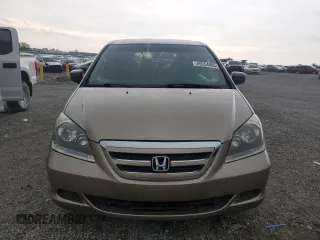 2005 Honda Odyssey LX with VIN 5FNRL382X5B107510, listed as a Copart auction lot 59554905 with 124,393 mi miles and Salvage title. Bid and sale history available at DreamBid. Image 5.