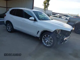 2019 BMW X5 xDrive40i z VIN 5UXCR6C56KLL40041, wystawiony jako IAAI lot #42261815 z przebiegiem 107 026 mil mil oraz . Historia ofert i sprzedaży dostępna na DreamBid. Obrazek 1.