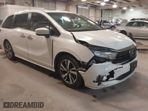 2021 Honda Odyssey Touring with VIN 5FNRL6H80MB026908, listed as a IAAI auction lot 41564765 with 116,453 mi miles. Bid and sale history available at carsss.com. Image 1.
