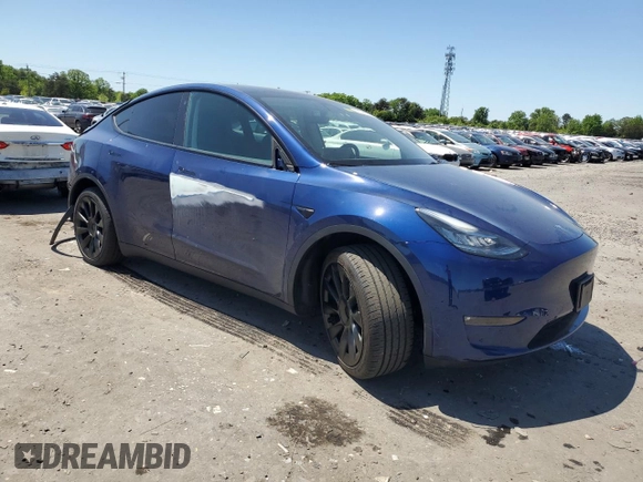 2022 Tesla Model Y Long Range z VIN 7SAYGDEEXNF444122, wystawiony jako Copart lot #54344735 z przebiegiem 33 230 mil mil oraz Szkody całkowita. Historia ofert i sprzedaży dostępna na DreamBid. Obrazek 4.
