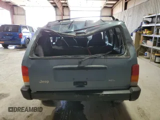1997 Jeep Cherokee Sport with VIN 1J4FJ68S4VL532609, listed as a Copart auction lot 46711285 with 273,930 mi miles and Salvage Title. Bid and sale history available at carsss.com. Image 6.