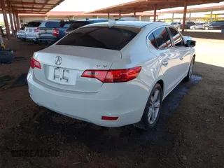 2014 Acura ILX z VIN 19VDE1F34EE015196, wystawiony jako IAAI lot #42107681 z przebiegiem 69 789 mil mil oraz . Historia ofert i sprzedaży dostępna na DreamBid. Obrazek 4.