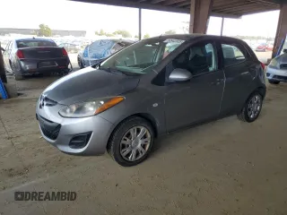 2013 Mazda Mazda2 Sport with VIN JM1DE1KZ5D0153225, listed as a Copart auction lot 50942555 with 105,958 mi miles and Salvage Title. Bid and sale history available at carsss.com. Image 1.