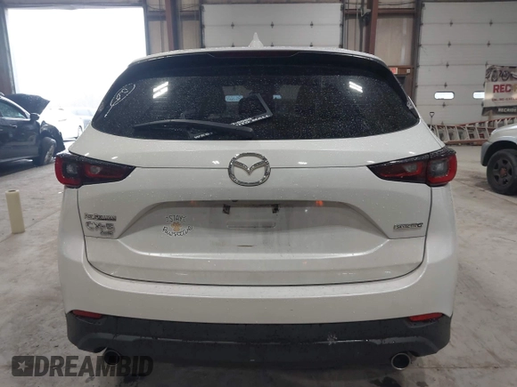 2023 Mazda CX-5 2.5 S with VIN JM3KFBAMXP0153362, listed as a IAAI auction lot 41875188 with 57,648 mi miles. Bid and sale history available at carsss.com. Image 16.