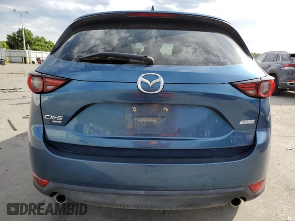 2018 Mazda CX-5 Grand Touring with VIN JM3KFBDM2J0347208, listed as a Copart auction lot 59357135 with 61,537 mi miles and Clean title. Bid and sale history available at DreamBid. Image 6.