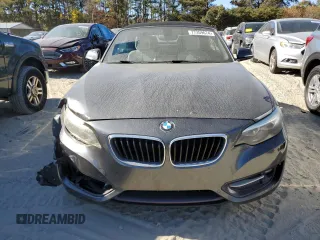 2016 BMW 2 Series 228i xDrive with VIN WBA1L9C55GV324854, listed as a Copart auction lot 77359674 with 101,768 mi miles and Salvage Title. Bid and sale history available at carsss.com. Image 5.